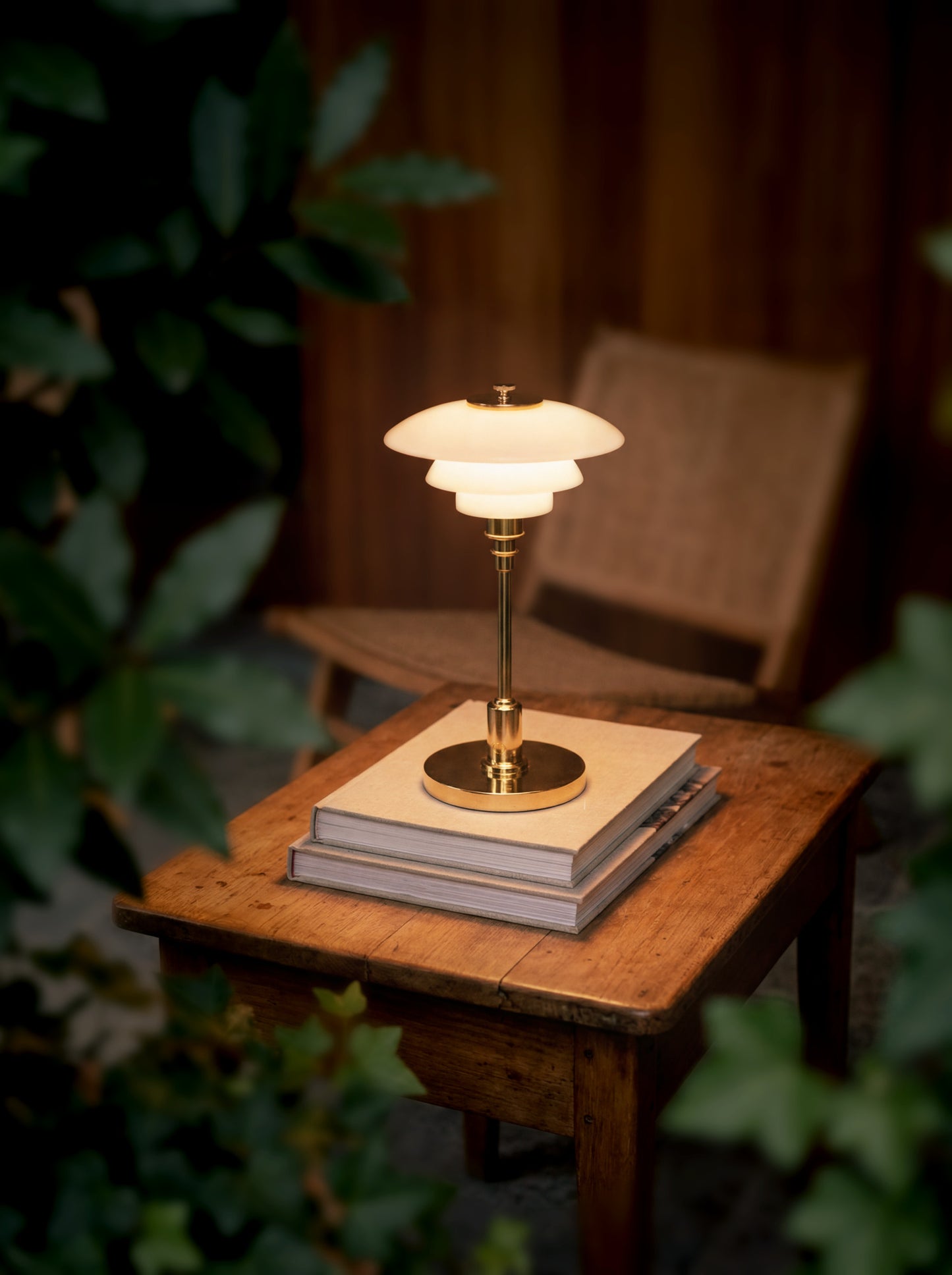 Louis Poulsen PH 1/1 Portable messing som eksklusiv bærbar designerlampe til bord og terrasse